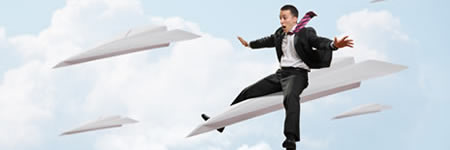 Airline manager flies on paper airplane